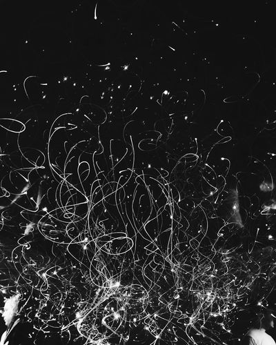 Abstract representation of fluid motion and light trails.